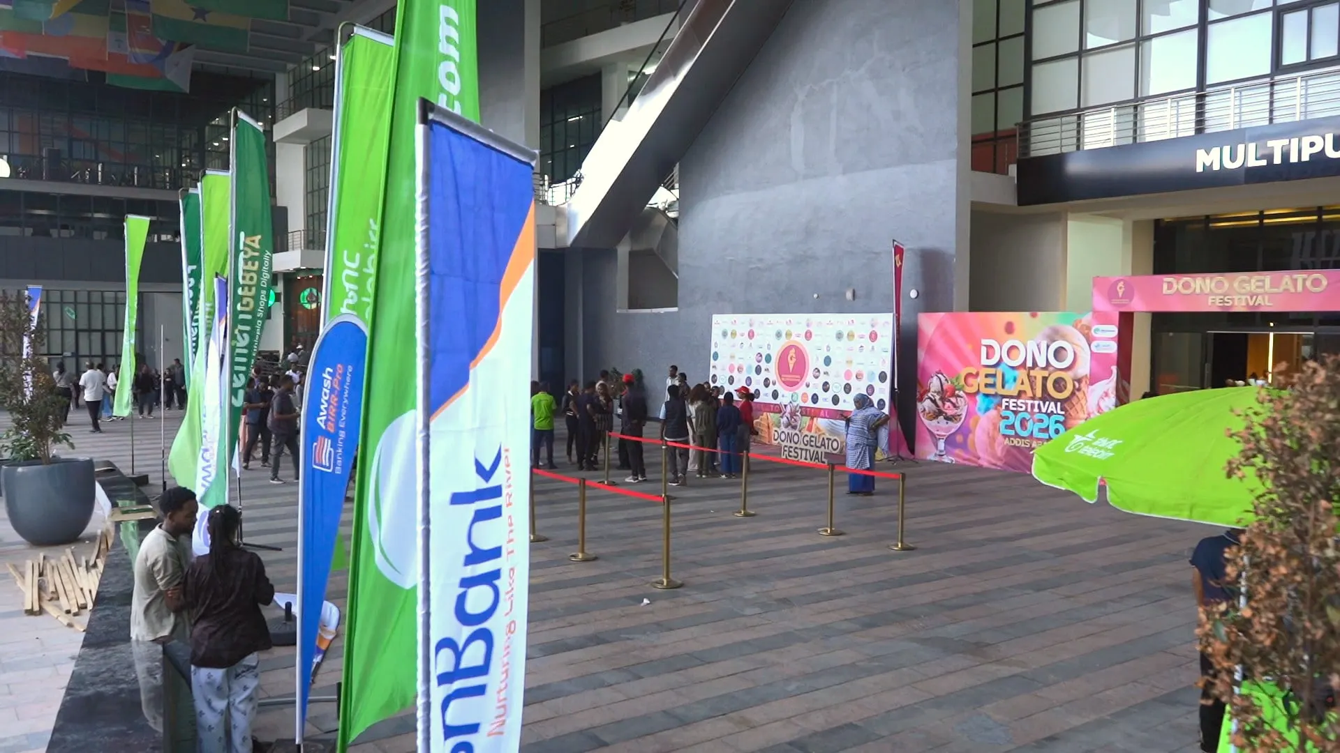 Sponsor banners lining the entrance stairs