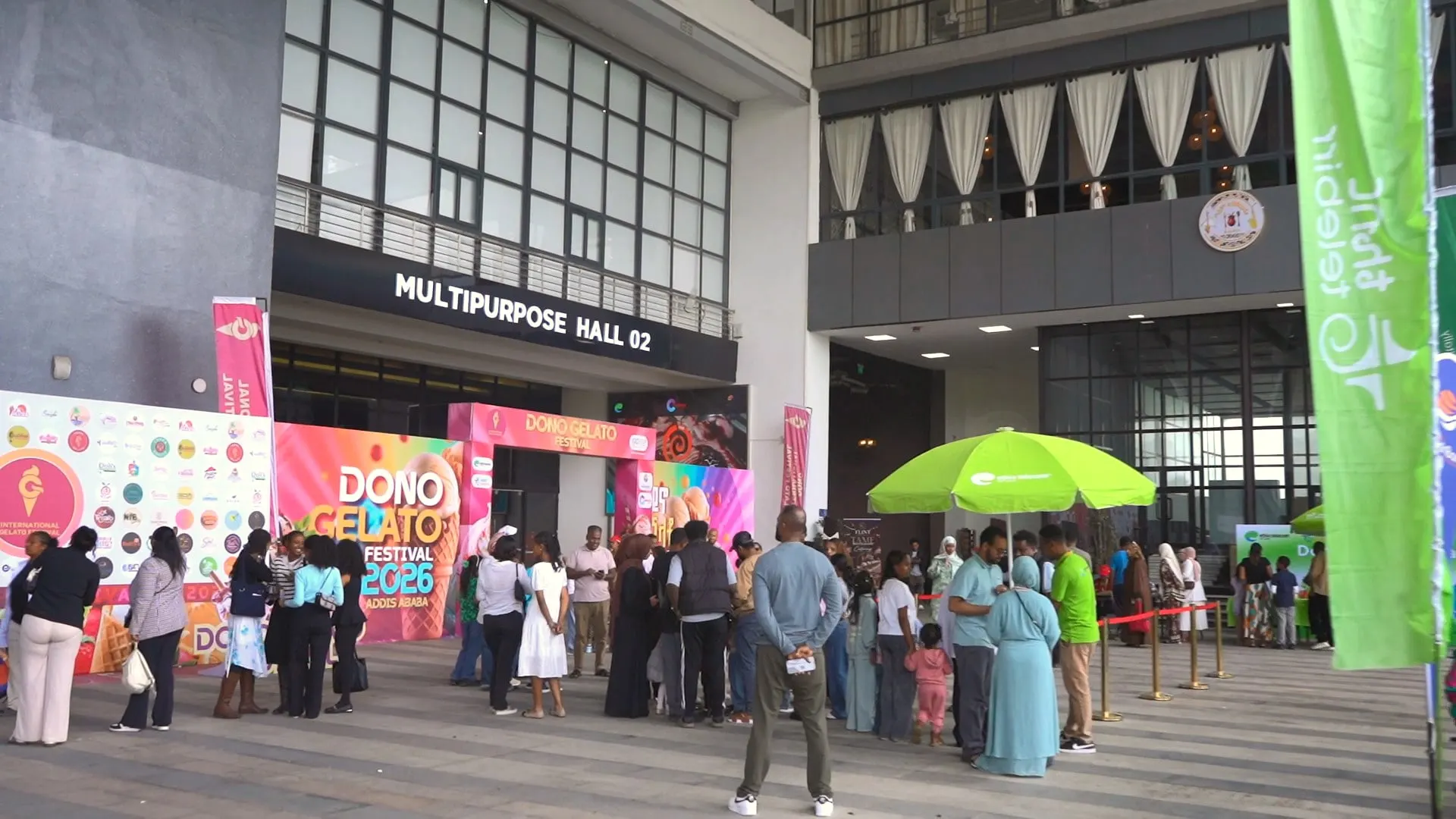 The Dono Gelato Festival entrance arch with visitors