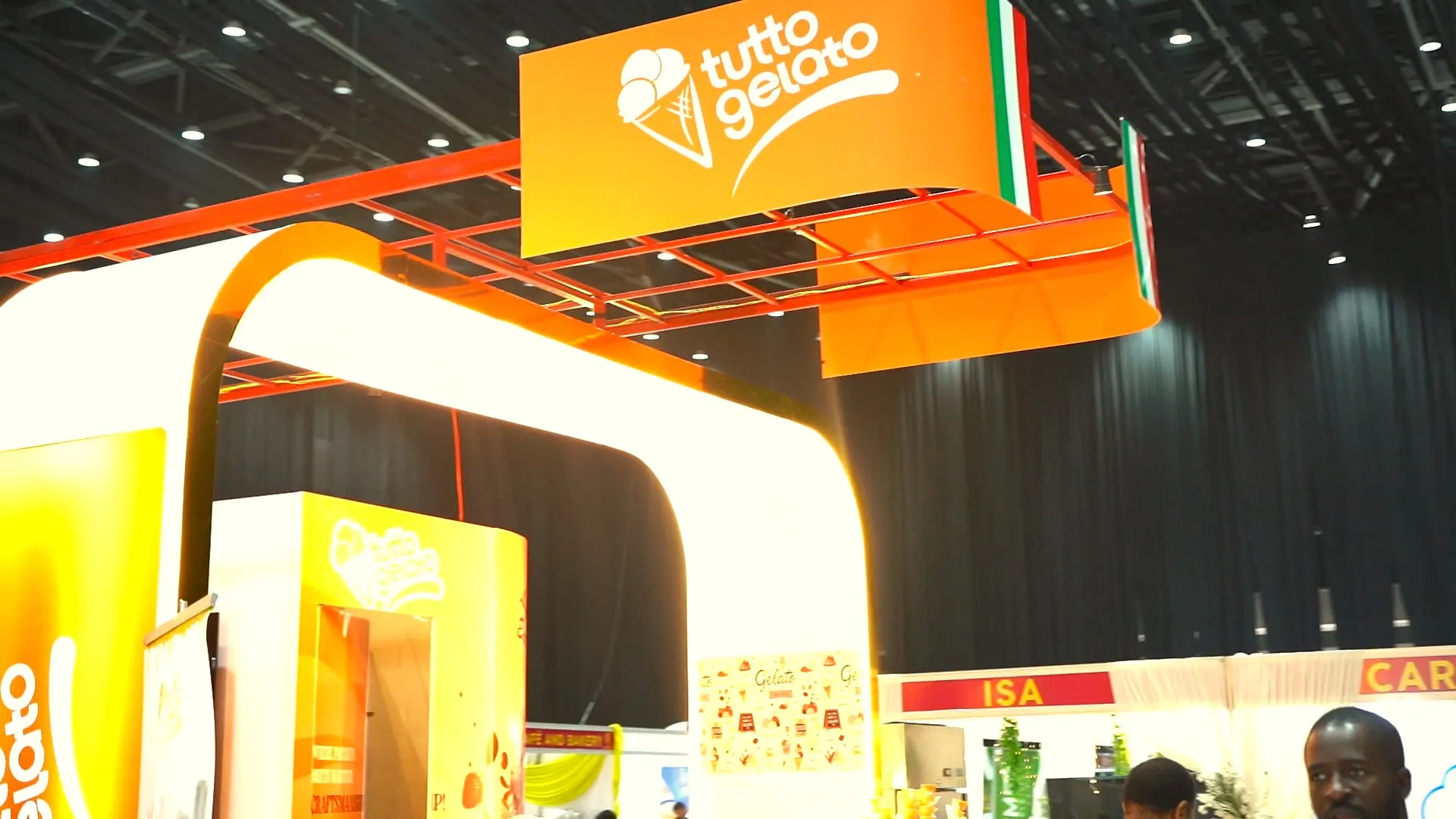The orange Italian gelato pavilion with Italian flags